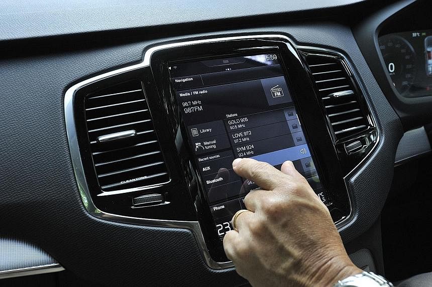 The console of the XC90 has a touchscreen that works like a tablet.