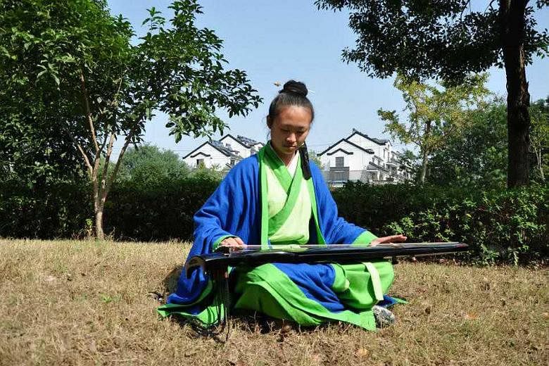 Ms Hao Liya, 22, has an engineering degree but has been ordained as a Taoist priest.