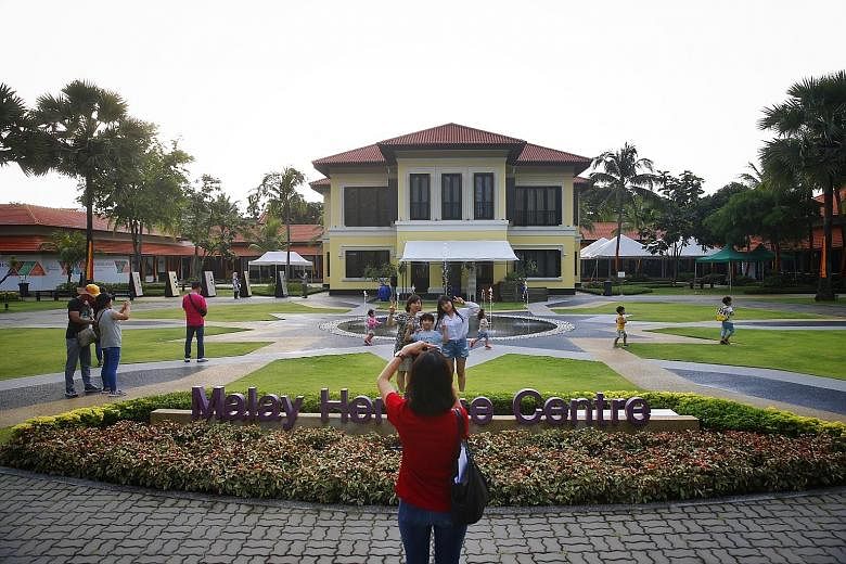 Tourists taking pictures at the Istana Kampong Gelam, the historic residence of Malay royals that is now home to the Malay Heritage Centre. It will be gazetted as a national monument on Aug 6.