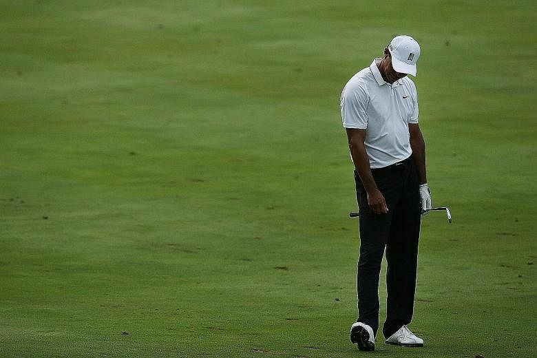 Tiger Woods, who engineered a turnaround on the back nine at the Quicken Loans National, says he is still working with swing coach Chris Como.