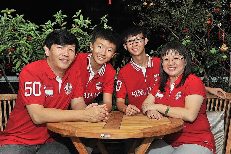 Mr Dessmond Lai and Mrs Carol Lai will be having a picnic at Marina Barrage on Friday with their sons Darren (second from right) and Clement.