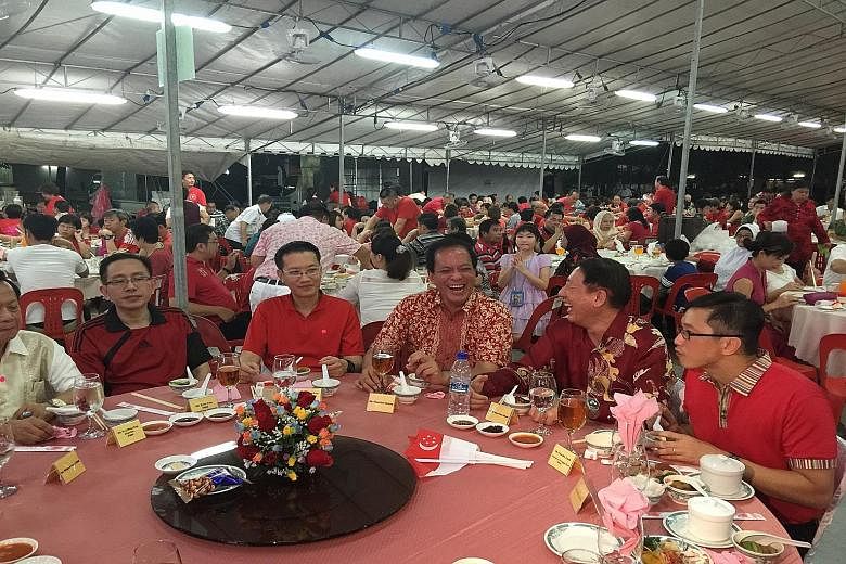 Mr Charles Chong (centre) at the National Day dinner last night with Deputy Prime Minister Teo Chee Hean (at right).