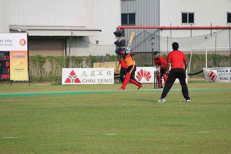 Chaminda Ruwan of Construction All-rounders hitting a six in the final to help his team lift the inaugural CricHQ Red Dot Trophy. They beat Technology Torpedoes by 31 runs at the Yorker Ground yesterday.