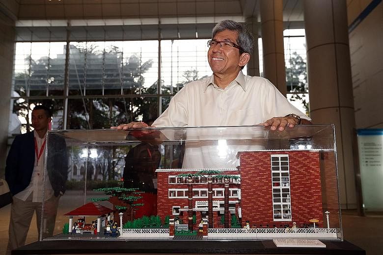 A mini Lego replica of the former red-brick National Library building brought back good memories for Minister for Communications and Information Yaacob Ibrahim yesterday. The display is part of "The Little Red Brick" Lego art installation, which also