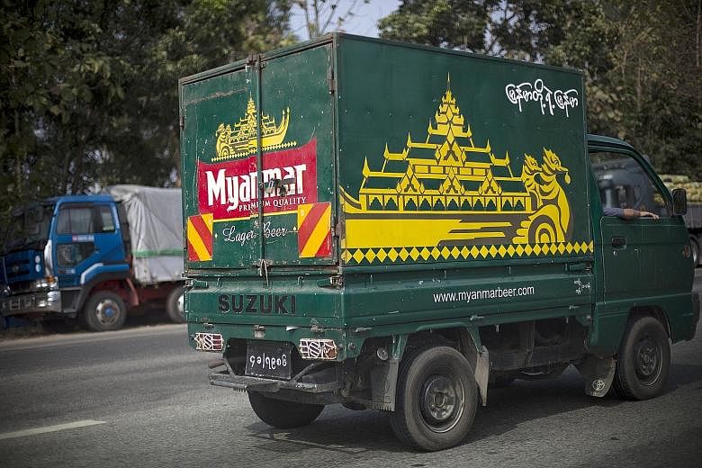 Myanma Economic Holdings' injunction against F&N, over a stake in Myanmar Breweries, was dismissed with costs.