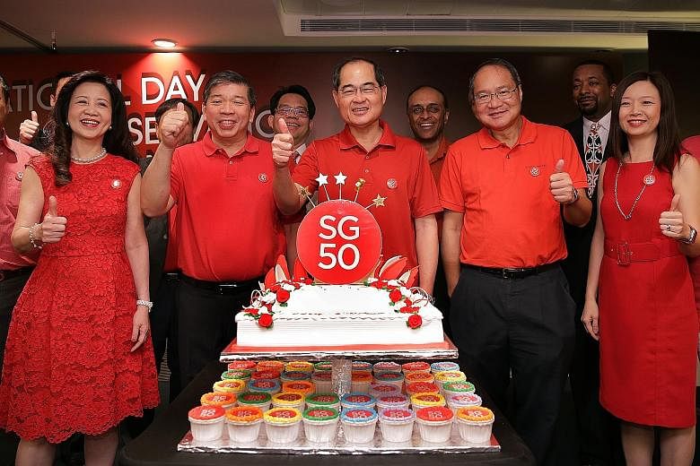 At the National Day observance ceremony organised by the Singapore Business Federation (SBF) yesterday were (from left) SBF Board of Trustees chairman Fang Ai Lian, SBF chairman Teo Siong Seng, Minister for Trade and Industry Lim Hng Kiang, SBF Board