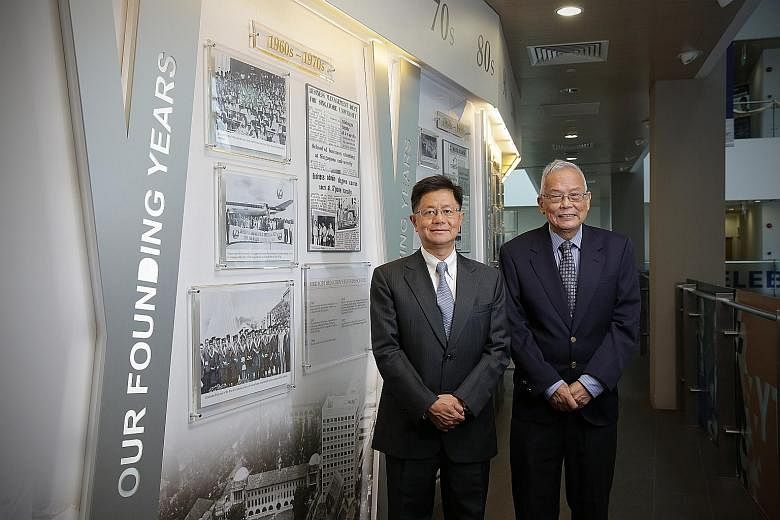 Professor Bernard Yeung (left), the current dean of NUS Business School, with Dr Lee Soo Ann, 76, who served as the business school's head from 1979 to 1985. Every head of the school has had an Asian connection.