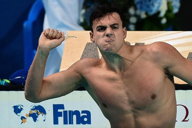 Britain's James Guy struck gold at the Fina World Championships yesterday with a shock win in the 200m freestyle final, as he beat China's Sun Yang at the wall. The 19-year-old touched at 1min 45.14sec to leave big names in his trail. He was just 0.0