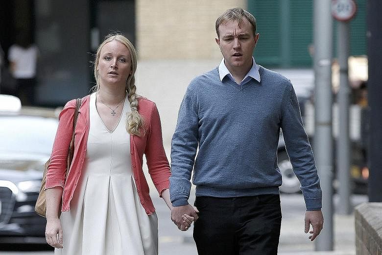 Tom Hayes arriving at Southwark Crown Court with his wife, Sarah. The 35-year-old former trader was sentenced to 14 years in jail after being found guilty of conspiring to rig Libor benchmark rates.