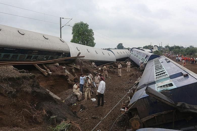 The trains, travelling in opposite directions, derailed within minutes of each other near the town of Harda (above) at about 11.30pm on Tuesday. They appear to have been hit by a sudden surge of water on the swollen Machak river. Roughly 300 people w