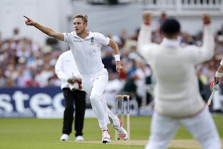 England's Stuart Broad celebrating his dismissal of Australia's Chris Rogers, his 300th Test scalp. He went on to claim seven more wickets, as Australia collapsed to 60 all out well before lunch on day one at Trent Bridge.