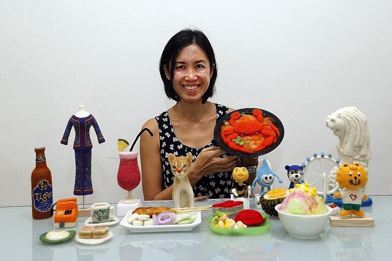 Ms Ng Hwee Hwee has created 50 wool sculptures of Singapore icons, including Tiger Beer, the Singapore Airlines kebaya, an orange payphone, the Kucinta, or Singapore cat, foods such as satay, chilli crab, durian, kueh and ice kachang, Teamy the Bee f