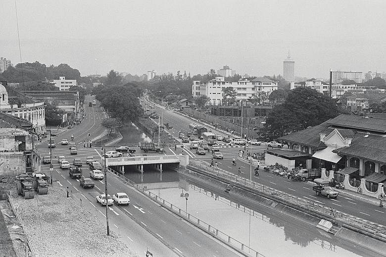 TANJONG PAGAR While the historic Jinrikisha Station along Tanjong Pagar road remains where it is today, the vehicular traffic which passes the 112-year-old building has changed. In the early 1960s, it was a trolley bus (right) but today, it is an air