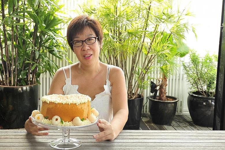 Ms Angeline Lim garnishes her rose chiffon cake with lychees and lime basil leaves.