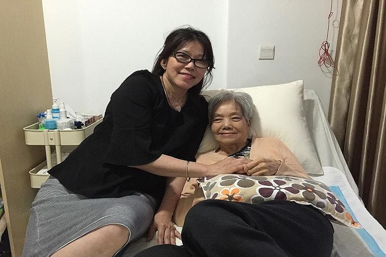 Ms Patsy Chia with her mother Mary Lai. Ms Chia wrote her book after being Madam Lai's caregiver for eight years.