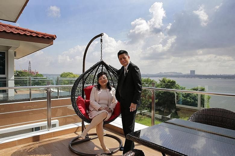 Mr David Yeo and his wife Annie Goh on the rooftop of their $6 million house in the Sembawang Park area. (Right, from top) a view of the exterior with lap pool; the interior; and the eight bungalows on 99-year lease which, according to ERA Real Estat