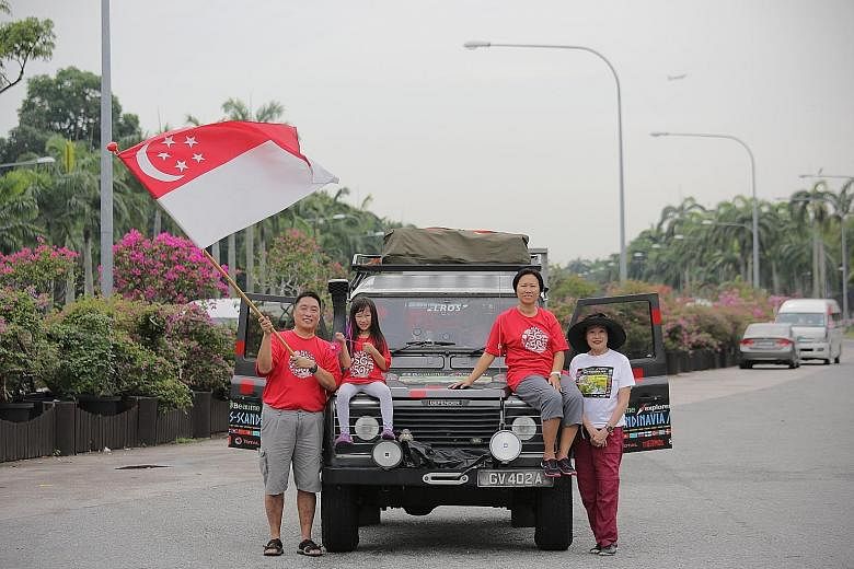 IT consultant Larry Leong, 47, may have missed the live telecast of the National Day Parade yesterday, but he is proudly bearing the Singapore flag in another way. 	He left Singapore yesterday morning for a road trip to London, which is about 20,000k