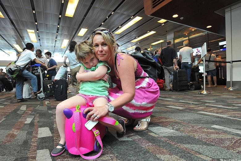 Australian housewife Melanie Dobson, 42, and her daughter Trinity, four, were among the Qantas passengers whose flight from Singapore to Melbourne was delayed on Sunday.