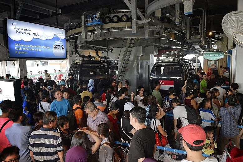 Mount Faber Leisure Group's offer of complimentary cable-car rides drew long and snaking queues yesterday. It was part of its SG50 Jubilee Weekend promotion. Many Singaporeans also took the opportunity of free or discounted tickets to visit attractio