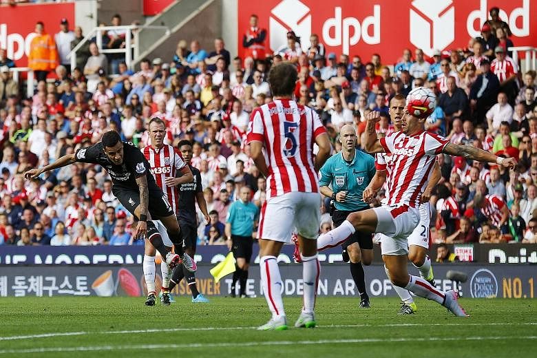 Philippe Coutinho scoring the game's only goal - turning and then taking a shot that curled and dipped beyond Jack Butland (not in picture) in the Stoke goal.