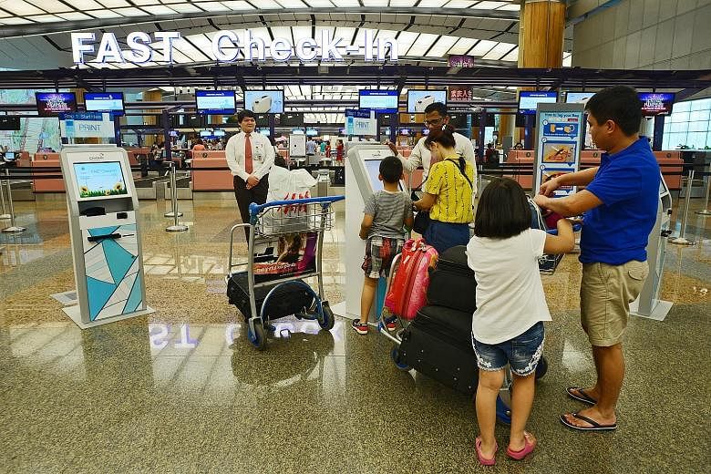 Changi Airport has installed close to 25 self-service check-in kiosks across SIA and SilkAir's check-in rows at T2 as it pushes for automation amid a tight labour situation.