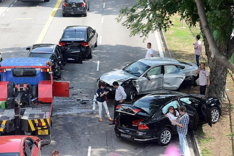 The scene of the crash which took place at about 9am yesterday along Simei Avenue. Witnesses say the driver of the silver Audi - believed to be a young man - was speeding and in the midst of overtaking when his car collided with the other vehicles an