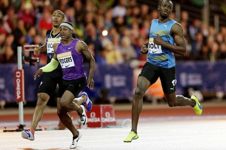 Usain Bolt (right), winning the 100m in London last month, headlines a 53-member Jamaican squad for the Beijing World Championships. 