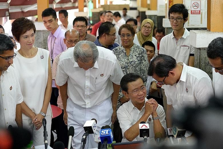 Mr Wong Kan Seng's PAP colleagues stood up and bowed to thank him for his contributions, including (from left) Mr Hri Kumar Nair, Mrs Josephine Teo, Dr Ng Eng Hen, Mr Chong Kee Hiong and Mr Zainudin Nordin.