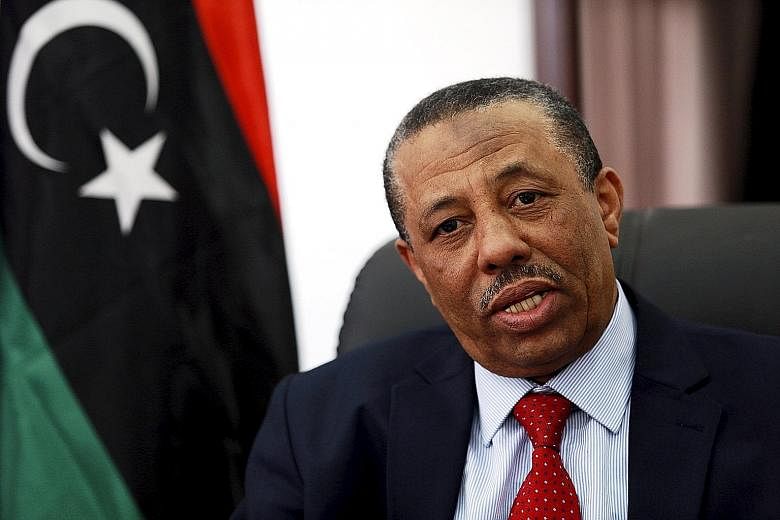 While being interviewed on TV on Tuesday, Libya's Prime Minister Abdullah al-Thani faced angry questions from citizens who held his government responsible for the lack of basic services, such as poor security.