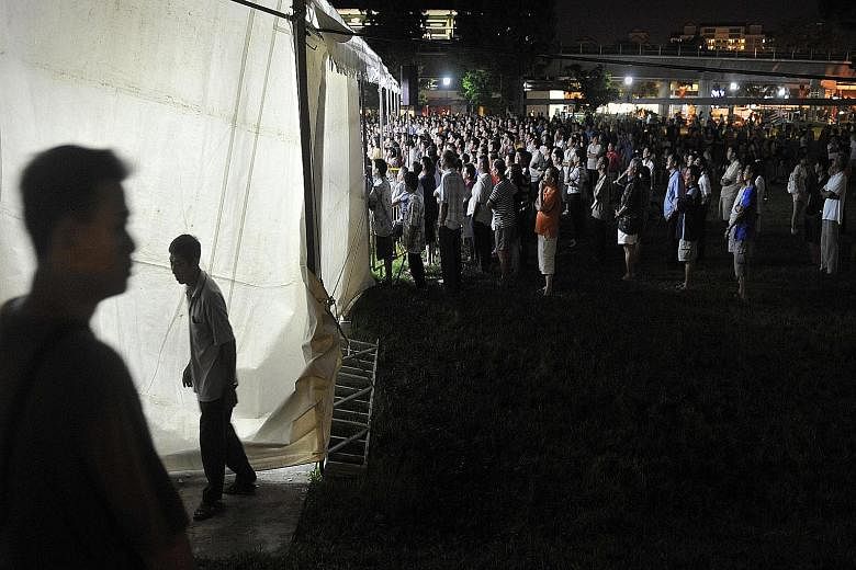 Residents catching a getai show near Yishun MRT station in 2011. The police reminder to keep getai shows and election campaigning activities separate, together with other recent developments, has reinforced talk that the election could be held next m