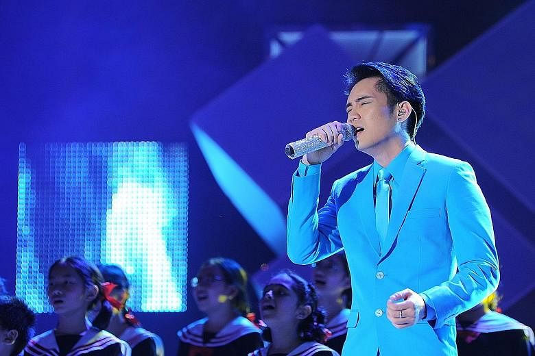 Desmond Ng wins $20,000 cash singing Jay Chou's hit Fearless and the ballad Father by the Chopstick Brothers.
