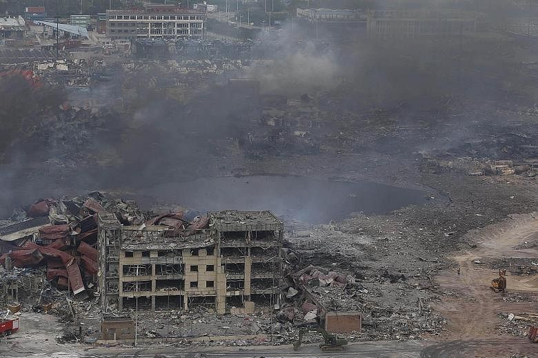 China has defended the firefighters who first hosed water onto the blaze in a warehouse storing volatile chemicals, which foreign experts said could have contributed to the two huge blasts that ripped through Tianjin. Evacuees at a school converted i