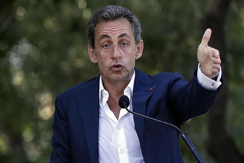 Mr Nicolas Sarkozy's (left) comeback campaign is underpinned by a shrewd political strategy. His first move was to engineer the merger of a number of centre-right political parties, with the aim of providing a single opposition platform against Mr Fr