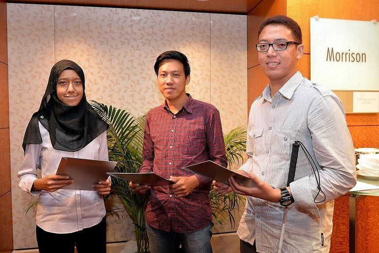 Some of the 19 Muslim graduates recognised yesterday included (from left) Ms Nur Syafiqah Mazlan, 23; Mr Muhammad Zailani Ismail, 25; and Mr Muhammad Sadik Mohamed, 26.
