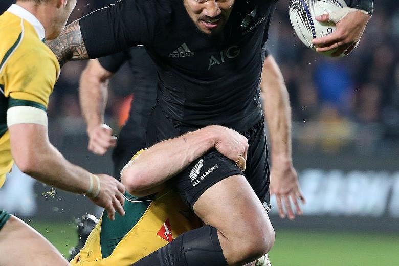 Ma'a Nonu of New Zealand scores a try during the 41-13 victory against Australia in the Bledisloe Cup match in Auckland yesterday.