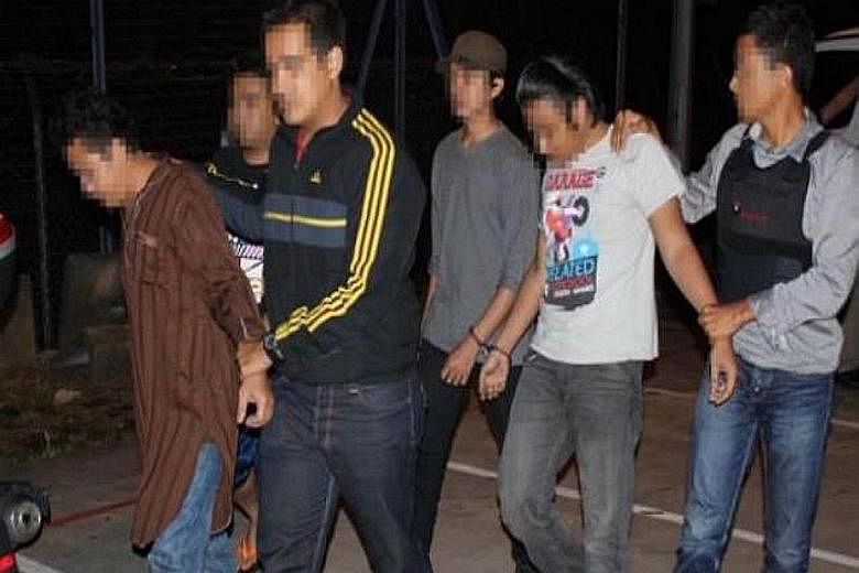 Men arrested in Malaysia for allegedly recruiting for the Islamic State in Iraq and Syria terror group.