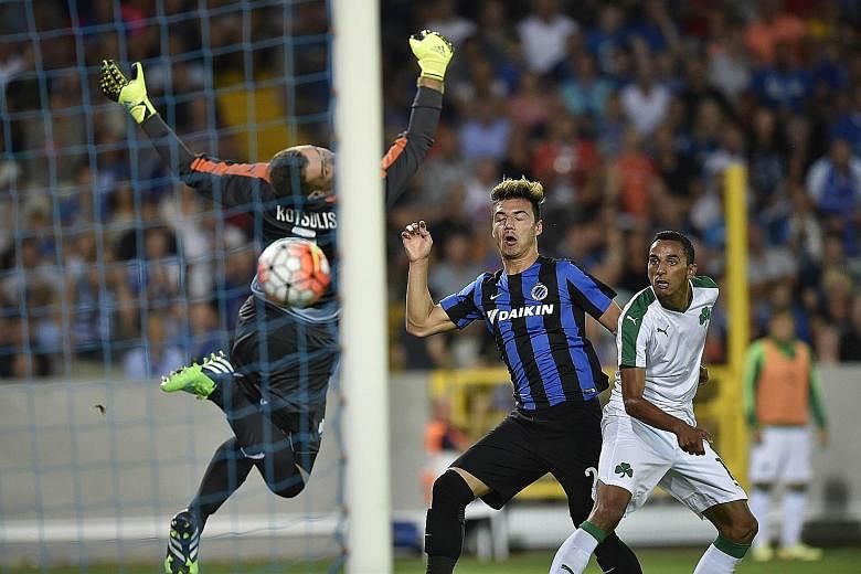 Club Brugge's right-back Dion Cools (centre) scoring against Panathinaikos to help his team book a place in the Champions League play-offs, with English giants Manchester United lying in wait tonight. The Malaysia-born teenager is a regular with the 