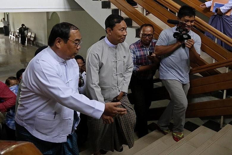 Speaker of Parliament Shwe Mann (centre) arriving at an event in Naypyitaw yesterday. The former top general could be impeached based on a petition signed by over 1,700 members of his own constituency, for his "disrespect" towards the military's role