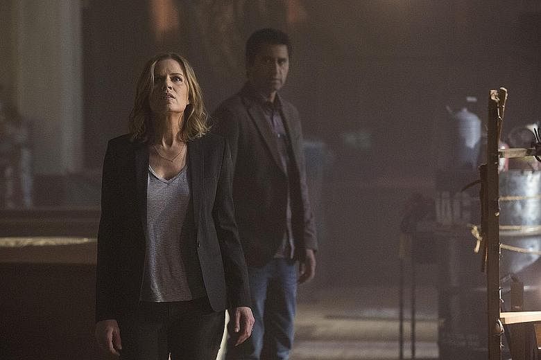 Kim Dickens and Cliff Curtis (both above) in Fear The Walking Dead.