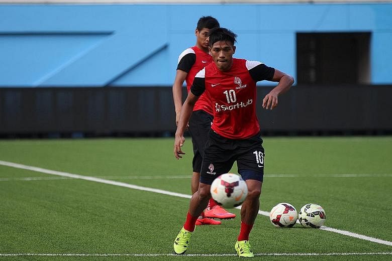 Khairul Nizam in action during LionsXII training at the Jalan Besar Stadium yesterday. The player, whose career has been derailed by a series of long-term injuries, is keen to make up for lost time.