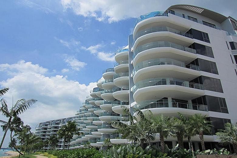 One property that was put up for auction was a 4,133 sq ft duplex penthouse at the Seascape (above) in Sentosa Cove. The apartment was sold for about $5.8 million in May - at a $5.2 million loss.