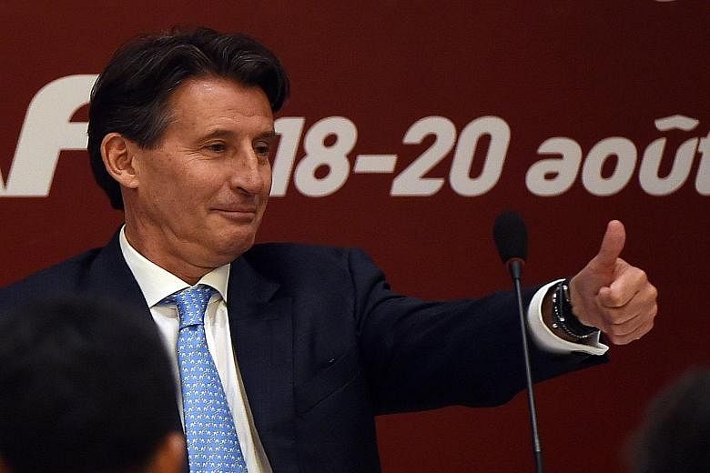 International Association of Athletics Federations (IAAF) president Sebastian Coe gives a thumbs-up after his election victory over Sergey Bubka in Beijing yesterday.