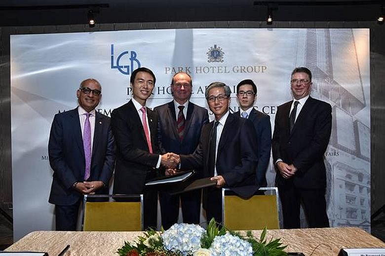 At the signing ceremony between Park Hotel Group and LGB unit Pirie Investments at the Grand Park Orchard on Monday were (from left) Park Hotel Group chief corporate officer Mohd Rafin, Park Hotel Group CEO Allen Law, South Australia's Minister for I