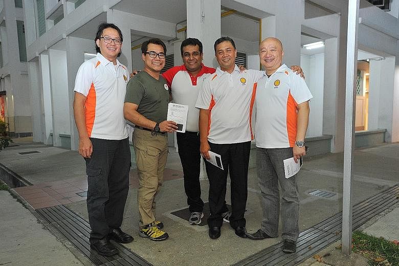 Mr Law Kim Hwee (above, left) and Mr Abdillah Zamzuri (above, right) are probable candidates for the joint team to contest under the SPP banner, together with (left photo, from left) Mr Robin Low, Mr Eman Lim (a volunteer), Mr Ravi Philemon, Mr Moham