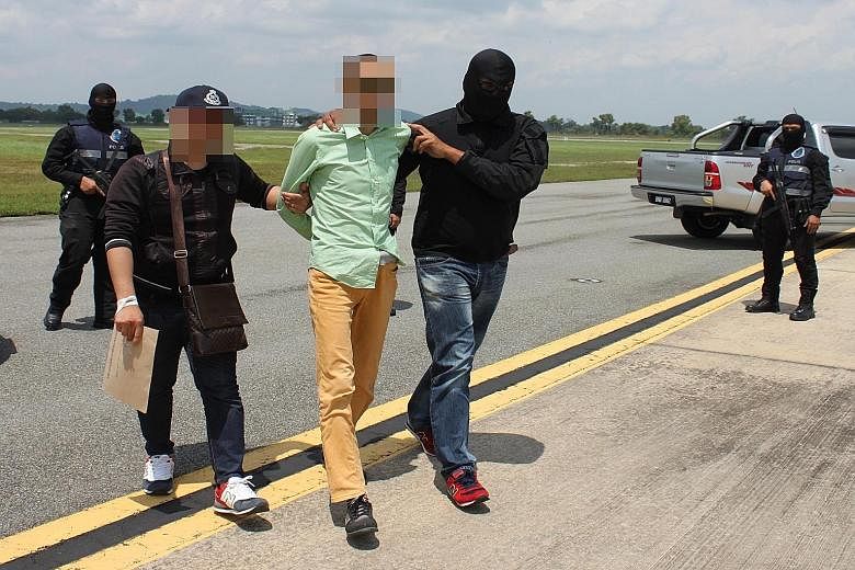 The six security personnel were arrested along with four others in a sting operation conducted across six states on Wednesday, said the Royal Malaysian Police. They are suspected of planning to obtain weapons to launch terror attacks.