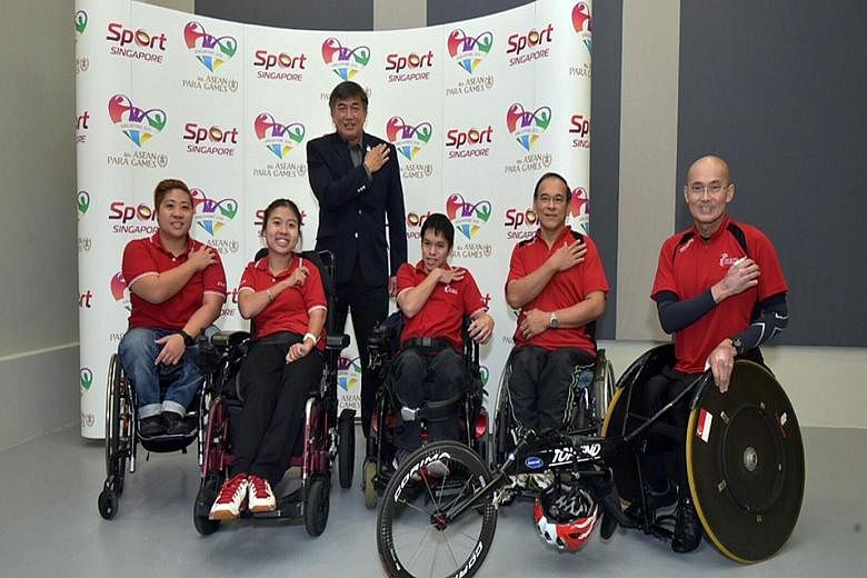 From left: Theresa Goh (swimming), Jeralyn Tan (boccia), Lim Teck Yin, chairman of the Sapgoc executive committee, Neo Kah Whye (boccia), Eugene Soh (table tennis) and William Tan (athletics). Singapore will field a record 145-strong team in the Asea