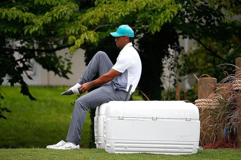 Tiger Woods at the Wyndham Championship on Thursday, where he produced his best score in an opening round in three years.