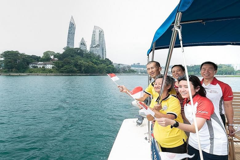 Senior citizens from Thye Hua Kwan (THK) Moral Activity Centre taking in the sights of Singapore's southern shores on a cruise yesterday organised by Marina at Keppel Bay. Joining the seniors were Keppel Volunteers and Keppel Land senior management i