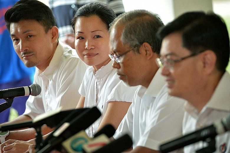 In the Tampines GRC lineup, (from left) Mr Baey Yam Keng, Ms Cheng Li Hui, Mr Masagos Zulkifli and Mr Heng Swee Keat. PAP named Ms Cheng and Mr Desmond Choo (not in picture) yesterday as the new candidates for this GRC.