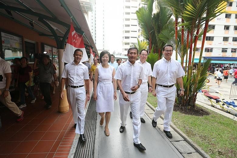 PAP MPs (from far left) Christopher de Souza, Sim Ann, Vivian Balakrishnan and Liang Eng Hwa will defend their seats in Holland-Bukit Timah GRC. Dr Teo Ho Pin (right) will also defend Bukit Panjang SMC.